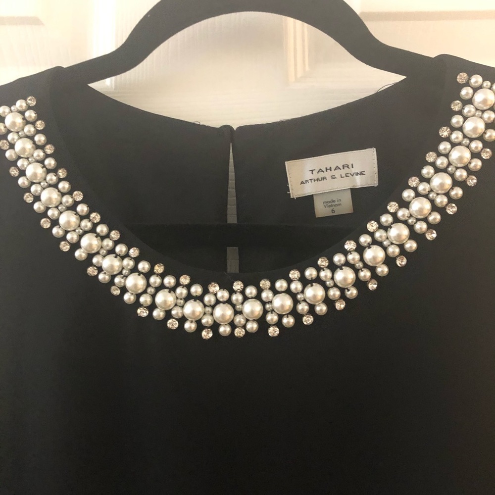 Tarahi jumpsuit w/ pearl and rhinestone neckline